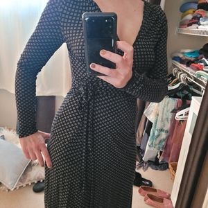 Navy/black wrap dress with tiny white diamond pattern. Size 3/4.